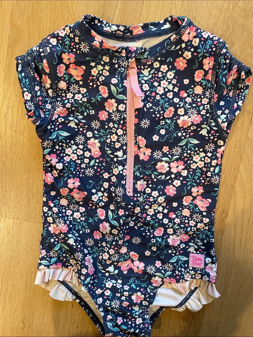 Ruffle Butts Navy Floral Kids Swim Rashguard with Pink Accents